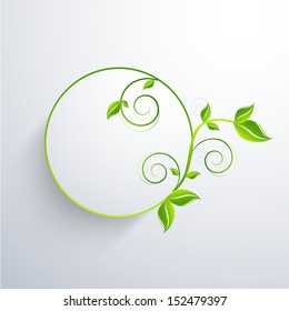 Nature concept with green leafs and space for your text on abstract grey background. 