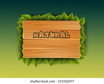 Nature concept with green leaves and text natural. 