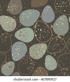 Nature eggs mottled. A seamless pattern of eggs mottled, bluish, gray, green, beige and contour on a dark brown background.