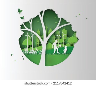 nature and environment concept with happy family in the tree frame .paper cut and digital craft style.
