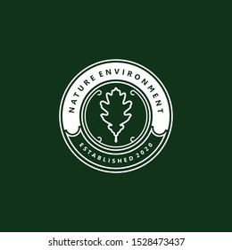 Nature environment logo with oak leaf element - greening forest outdoor