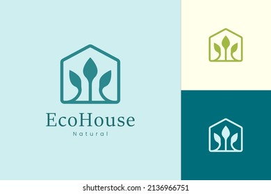 Nature green house logo with tree and leaf shape 