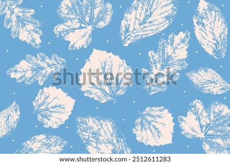 Nature grunge background with fall leaves in blue and white color. Stamp leaves, hand-drawn imprints. 