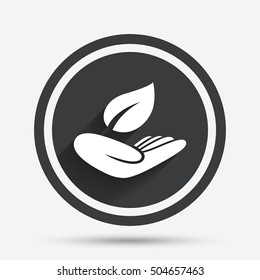 Nature insurance sign. Hand holds leaf symbol.