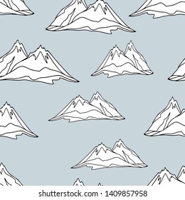 Nature seamless pattern with stylized mountains in hand drawn sketch style. Stylized hills as a design elements. Hand drawn line art. Isolated on blue 