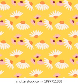 Nature seamless pattern with white and pink meadow daisy flowers ornament. Bright yellow background. Designed for fabric design, textile print, wrapping, cover. Vector illustration.
