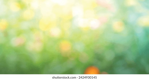 Nature spring background with abstract blurred green grass and flower background