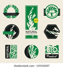 Nature-themed labels, banners and badges with green leaves. Vector design elements.