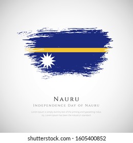 Nauru flag made in brush stroke background. Independence day of Nauru. Creative Nauru national country flag icon. Abstract painted grunge style brush flag background.