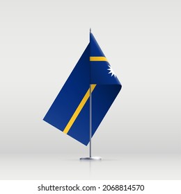 Nauru flag state symbol isolated on background national banner. Greeting card National Independence Day of the Republic of Nauru. Illustration banner with realistic state flag.