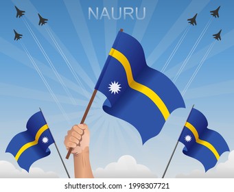 Nauru flags fluttering under the blue sky