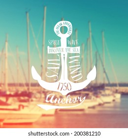 Nautical anchor label on blurry marina background. Vintage Vector illustration