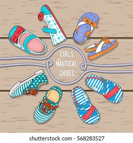 Nautical baby girls shoes arranged in a circle	

