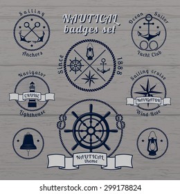 Nautical blue round vintage badges set on grey wooden background vector illustration