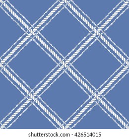 Nautical crossed rope seamless pattern. Endless navy illustration with white fishing net ornament and crossing cord on blue backdrop. Trendy maritime style background. For fabric, wallpaper, wrapping