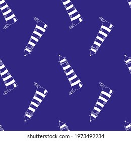 Nautical navy blue seamless pattern with white lighthouse. Cute seamless background with light tower. Marine wallpaper. Cute textile design. Vector illustration. 