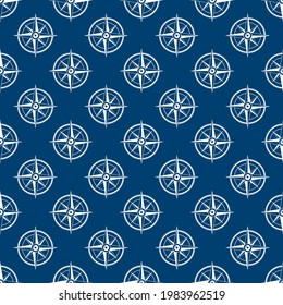 Nautical seamless pattern with  compass on blue background. Ship and boat steering wheel ornament. Marine wallpaper with rudder. Summer vector flat illustration.