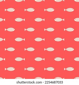 Nautical seamless pattern with swimming cartoon fish