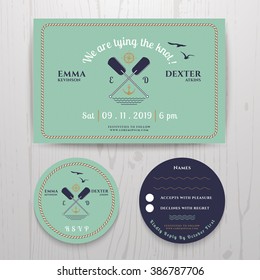 Nautical twin paddle wedding invitation and RSVP card template set on wood background