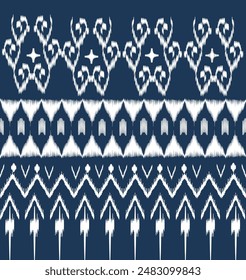 Navy blue background Thai ikat feather motif. Motif ethnic ikat seamless pattern oriental all over ogee design. Simple geometric chain print for decoupage paper, apparel textile, fashion garment