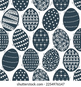 Navy blue Scandinavian seamless vector design is perfect for a spring celebration. Happy moving and dancing Easter eggs pattern is cute and fun.