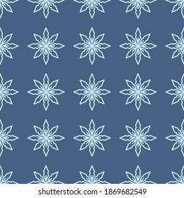 Navy blue seamless pattern with simple blue snowflakes for Christmas and New Year design, wrapping paper, wallpapers. 