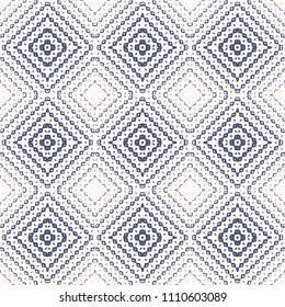 Navy blue and white geometric seamless pattern with small rhombuses, lines, squares, grid. Vector ornamental background with halftone transition effect. Ethnic folk motif texture. Repeatable design