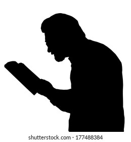 Nearsighted man with glasses reading book close to eyes