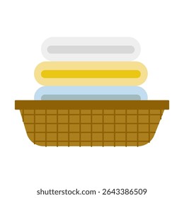 Neatly folded towels in a wicker basket for organized laundry storage
