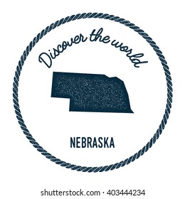 Nebraska map in vintage discover the world rubber stamp. Hipster style nautical postage stamp, with round rope border. Vector illustration.