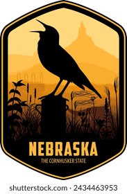 Nebraska vector label with western meadowlark and bison skull on the prairie near Chimney Rock National Historic Site