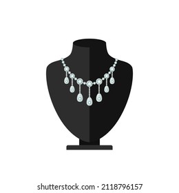 Necklace with diamonds on a jewellery bust in black.