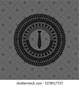 necktie icon inside dark emblem