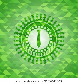 necktie icon inside green emblem with mosaic ecological style background. 