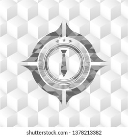 necktie icon inside grey badge with geometric cube white background