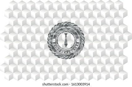 necktie icon inside grey emblem with geometric cube white background