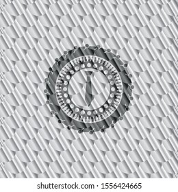 necktie icon inside silver badge. Scales pattern. Vector Illustration. Detailed.