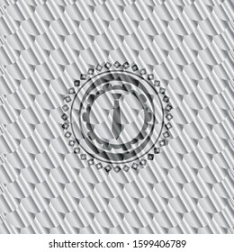 necktie icon inside silver badge. Scales pattern. Vector Illustration. Detailed.