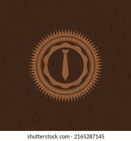 necktie icon inside wooden emblem. 