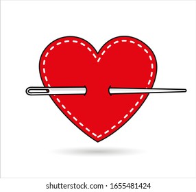 needle goes through a red heart made of fabric on a white background, isolated object. Sign, a symbol of love 