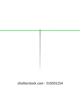 Needle in silver design hanging on green thread
