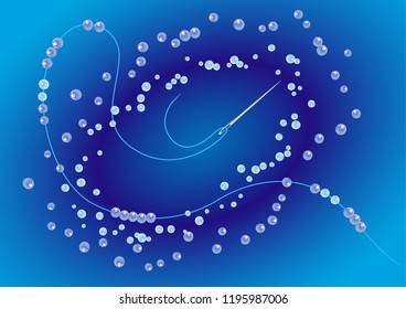Needle with thread and beads on a blue background