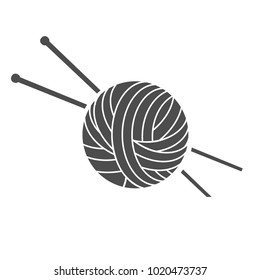 needles for knitting in a tangle of thread