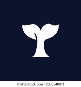 Negative space alphabet initial icon logo T with a design of a FISH TALE