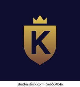 Negative space letter K in shield shape logo.