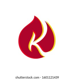 Negative space letter K within a fire