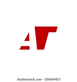 AT negative space letter logo red