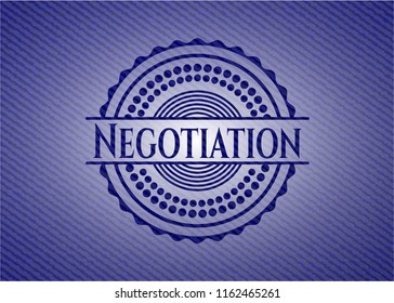 Negotiation emblem with jean background