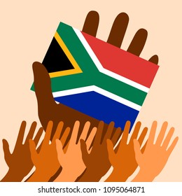Nelson Mandela International Day. 18 July. The concept of a political holiday. Flag in hand of the Republic of South Africa. Raised Hands