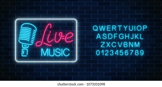 Neon alphabet and signboard of nightclub with live music. Glowing street sign of bar with karaoke
